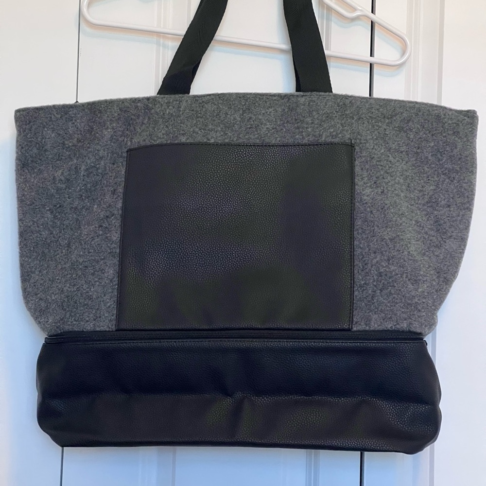 Travel tote with shoe compartment. Zip top